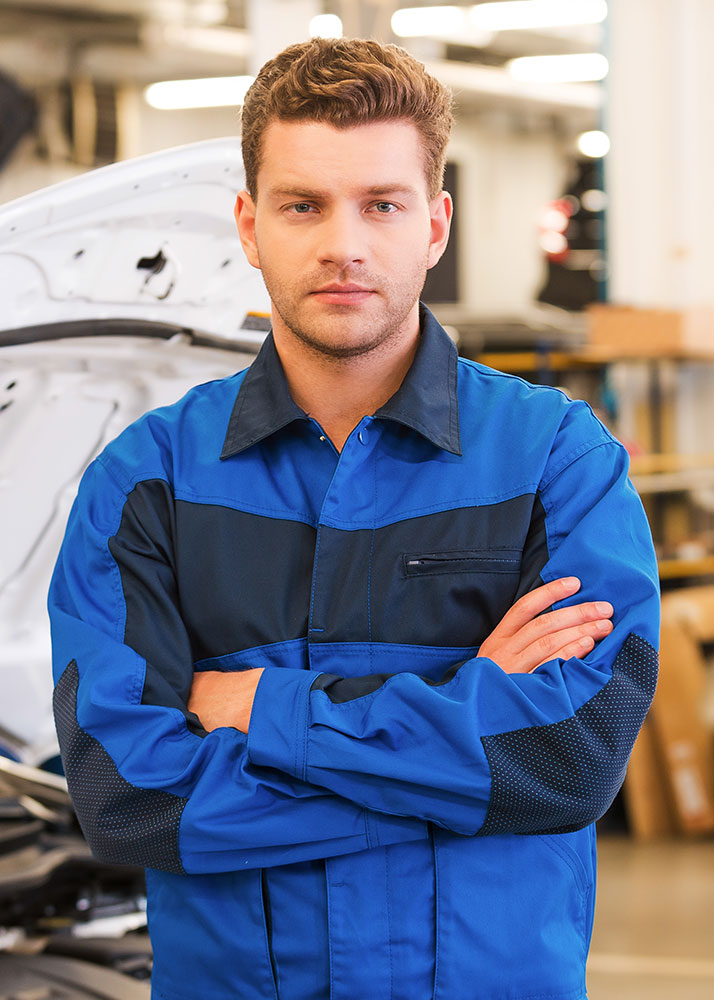 confident and concentrated mechanicc